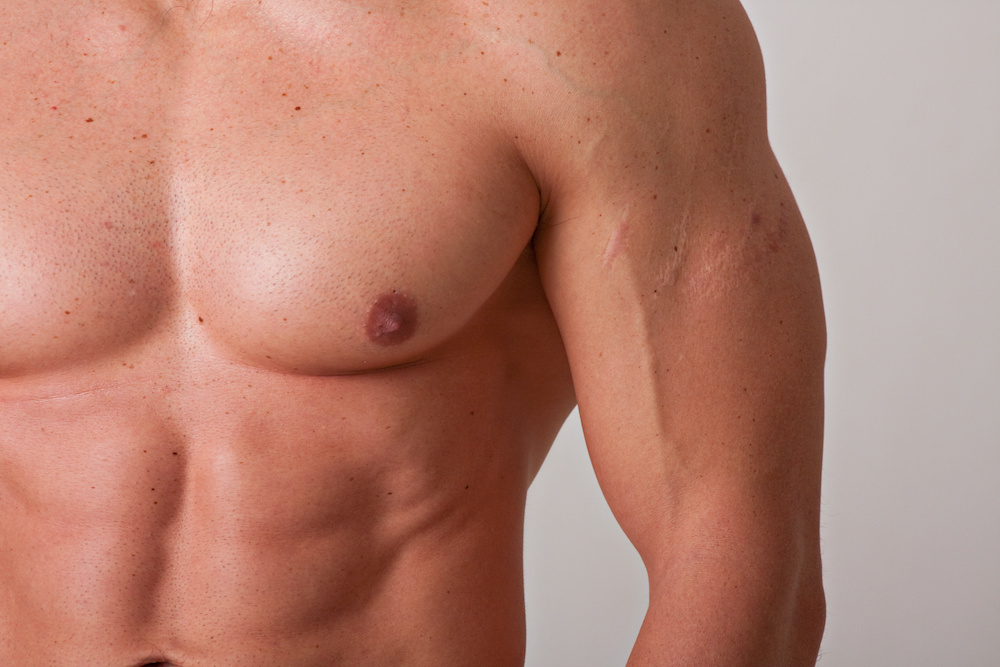 mans toned chest