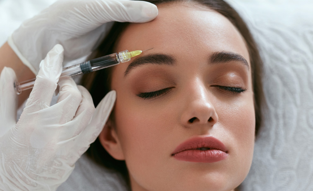 Beauty Injections. Woman On Rejuvenation Procedure In Clinic